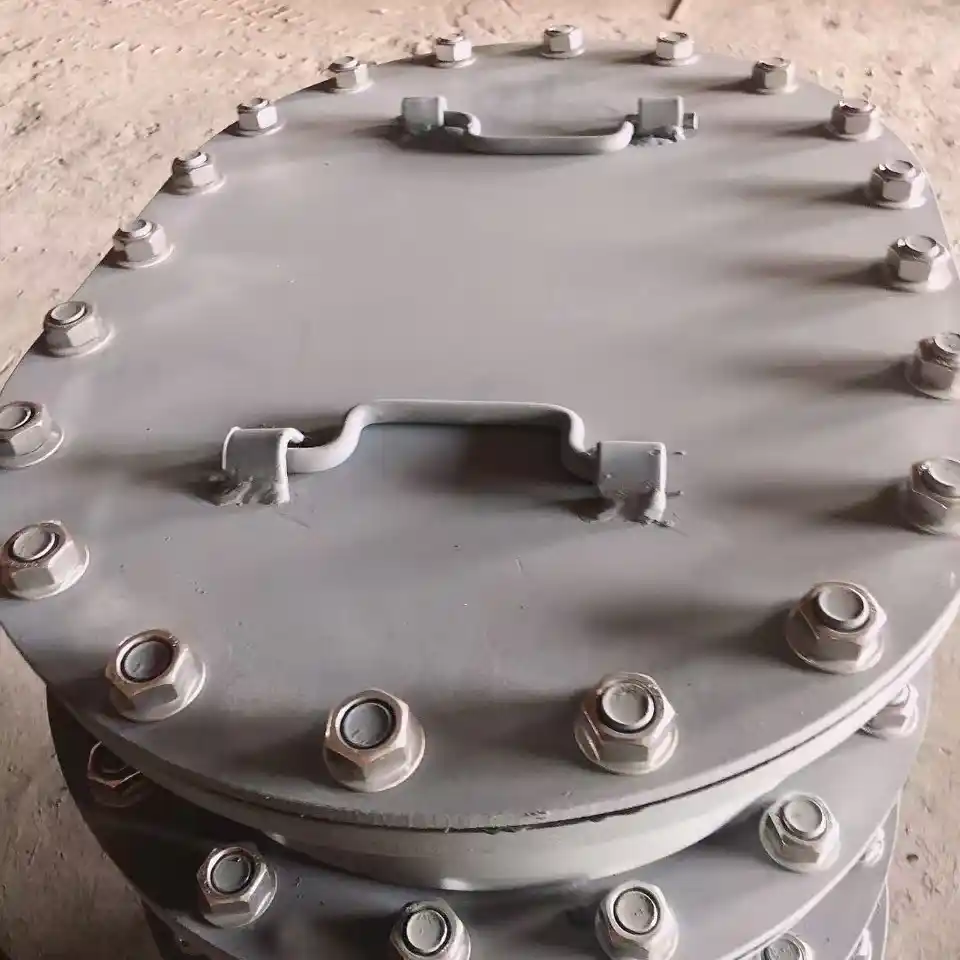 Cast steel deck manhole cover